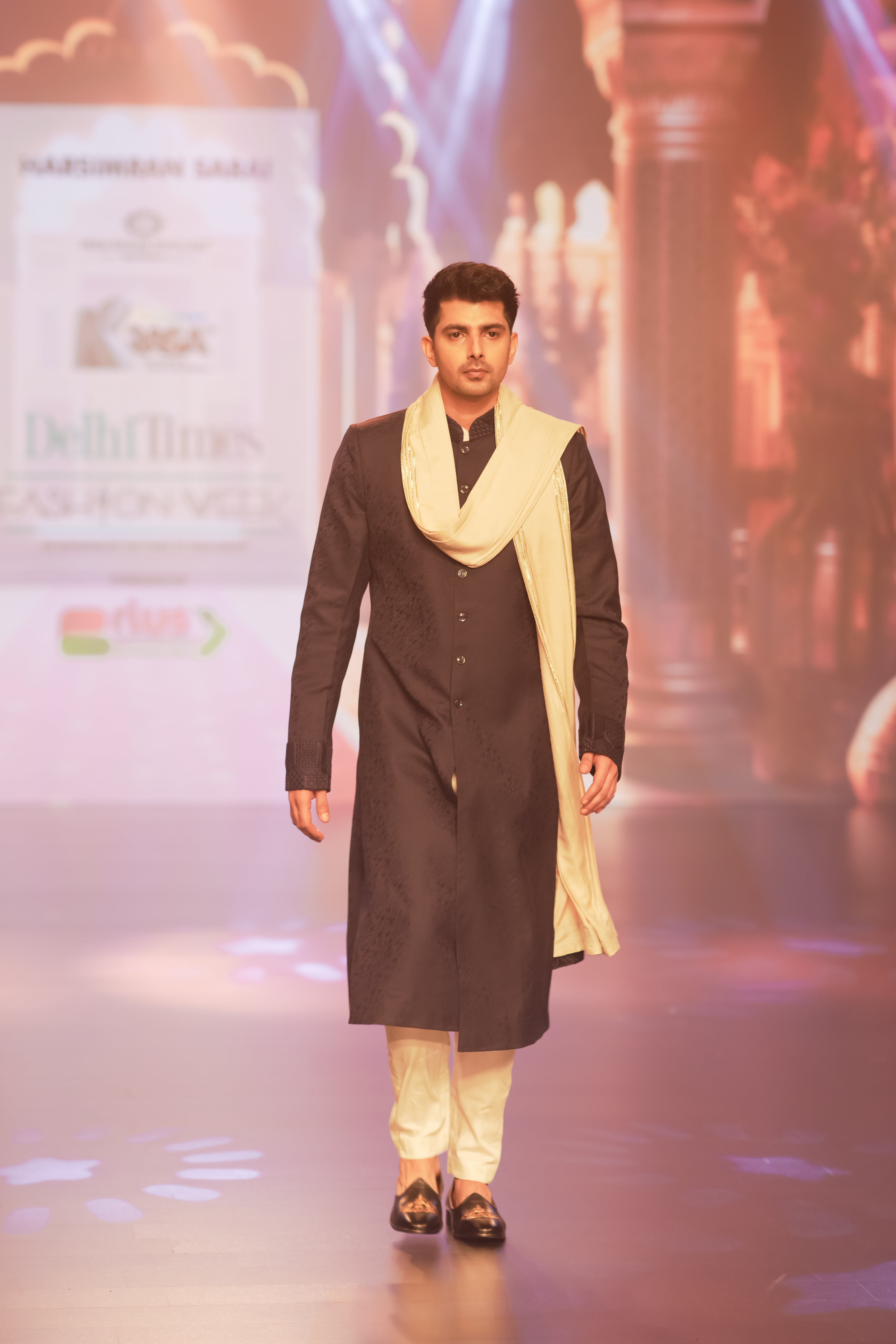 Regal Elegance: Blue Silk Nehru Jacket with Off-White Kurta and Pyjama Ensemble