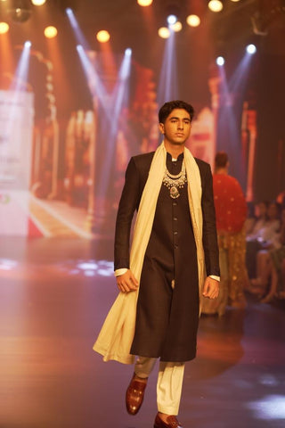 Regal Elegance: Raw Silk Nehru Jacket with Off-White Kurta and Pyjama Ensemble