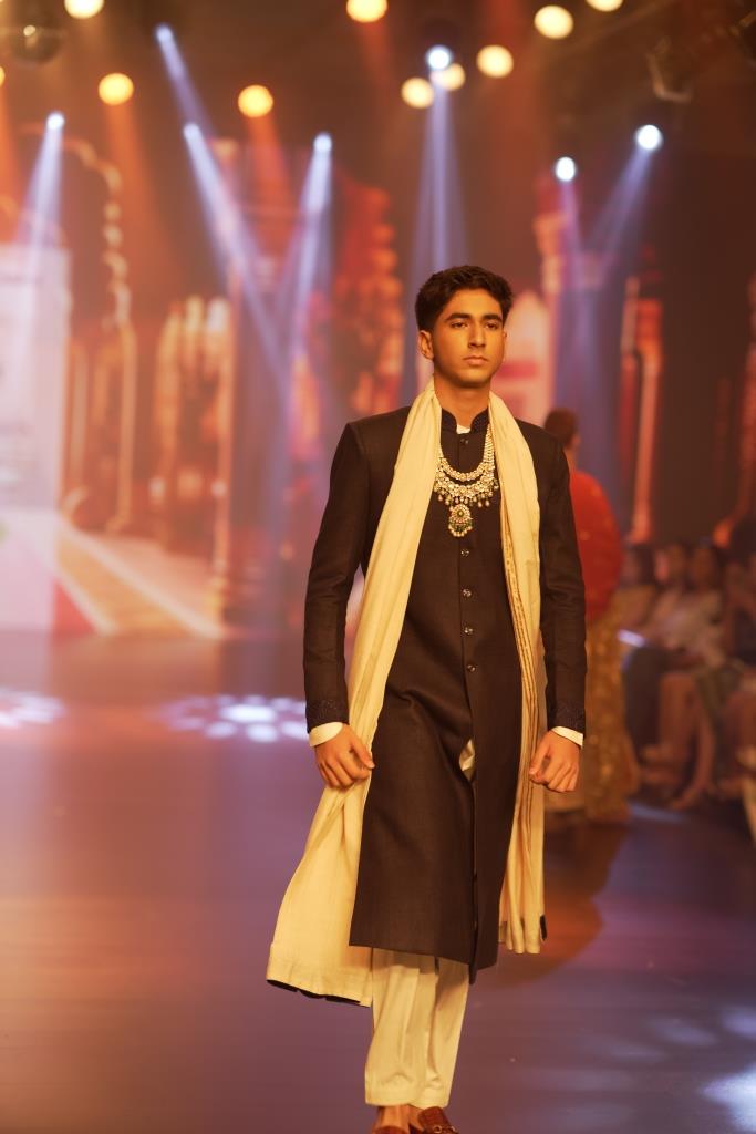 Regal Elegance: Raw Silk Nehru Jacket with Off-White Kurta and Pyjama Ensemble