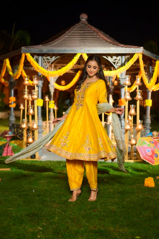 Yellow Silk Anarkali with heavy Dupatta